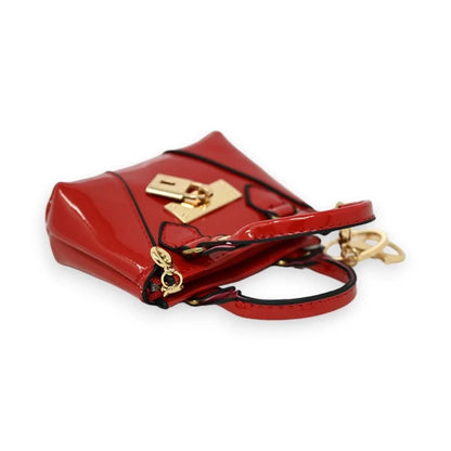 Porte-clés porte-monnaie rouge vernis avec fermeture dorée, élégant et compact