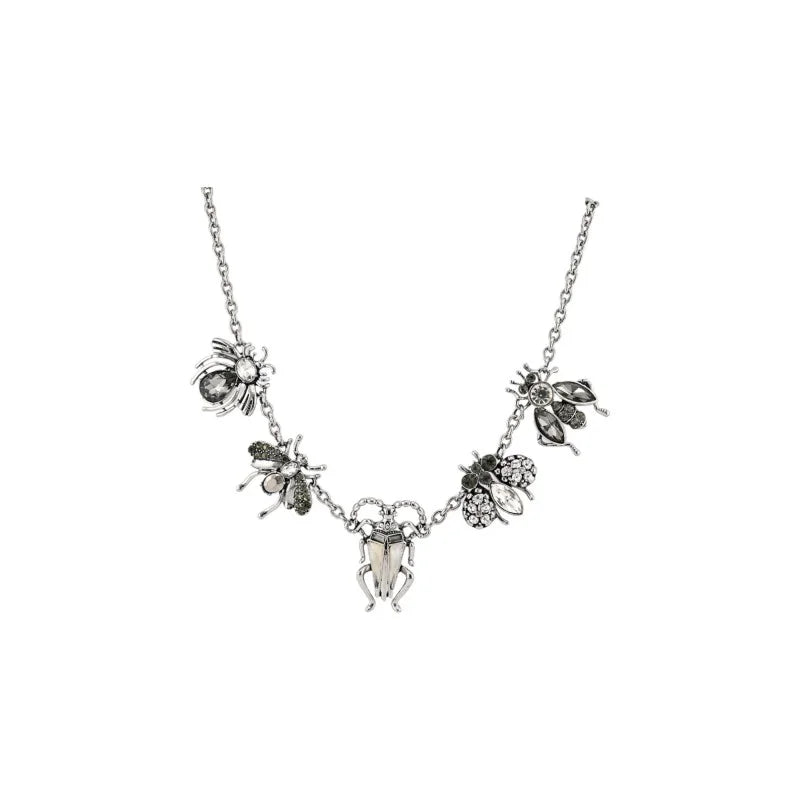 Collier fantaisie argenté avec pendentifs insectes et fleurs, style vintage chic
