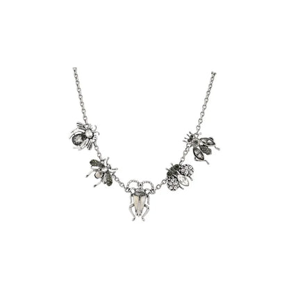 Collier fantaisie argenté avec pendentifs insectes et fleurs, style vintage chic