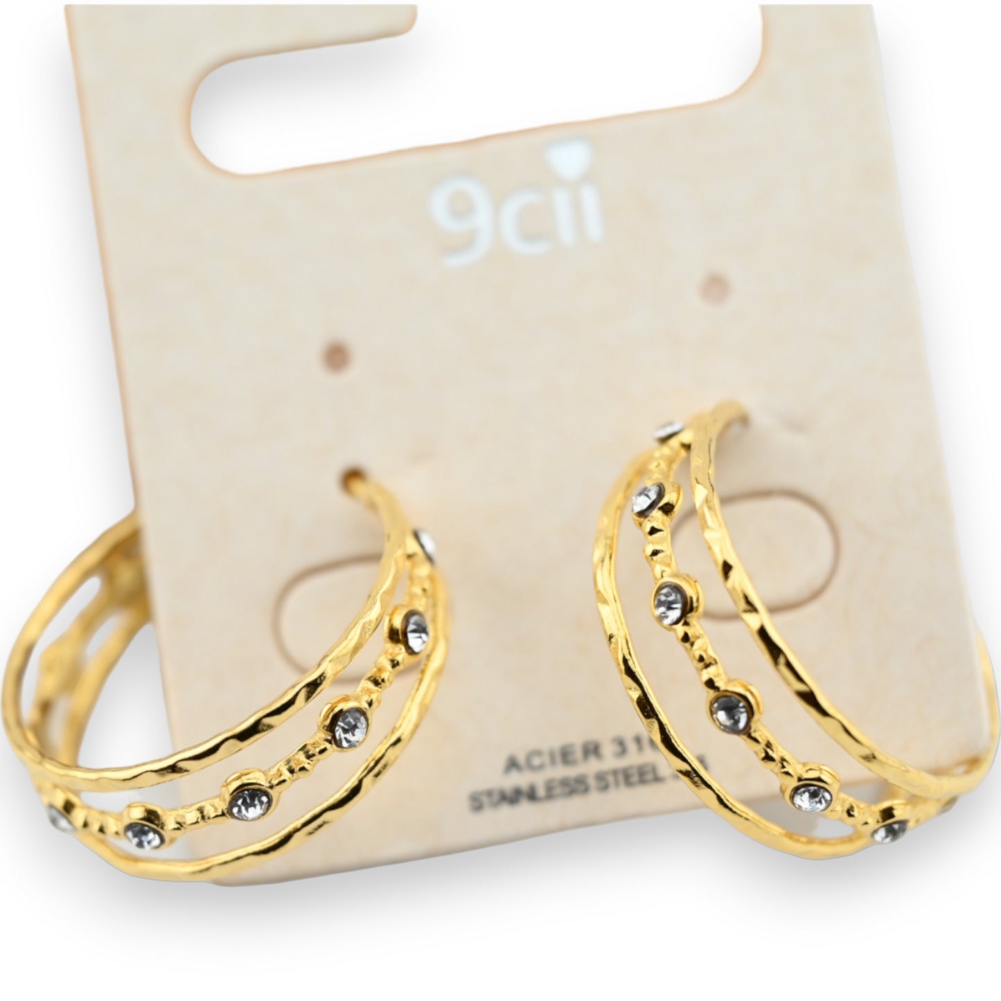 Boucle d'oreille anneau acier doré