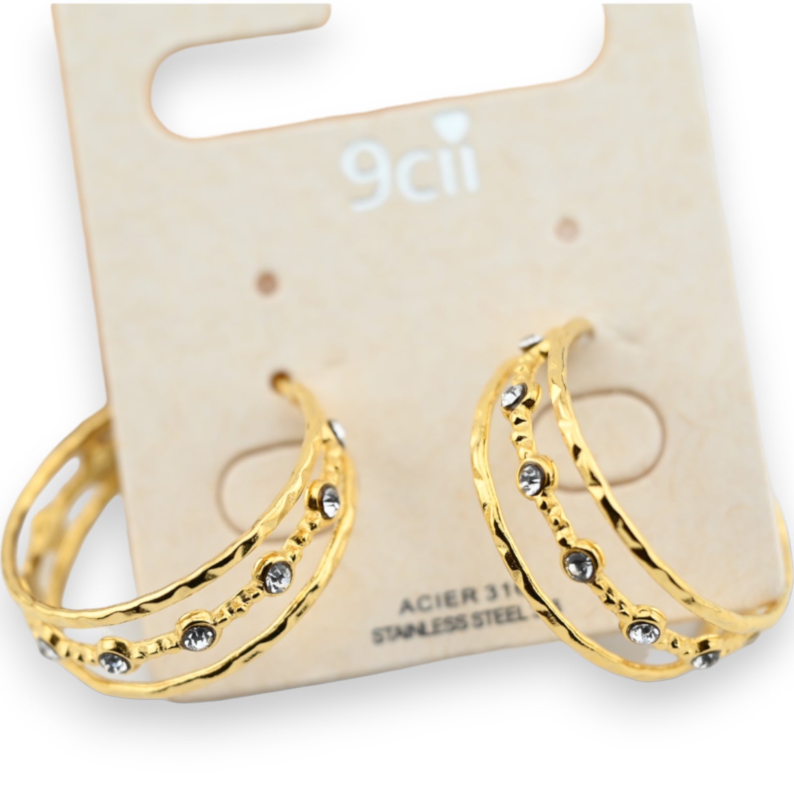 Boucle d'oreille anneau acier doré