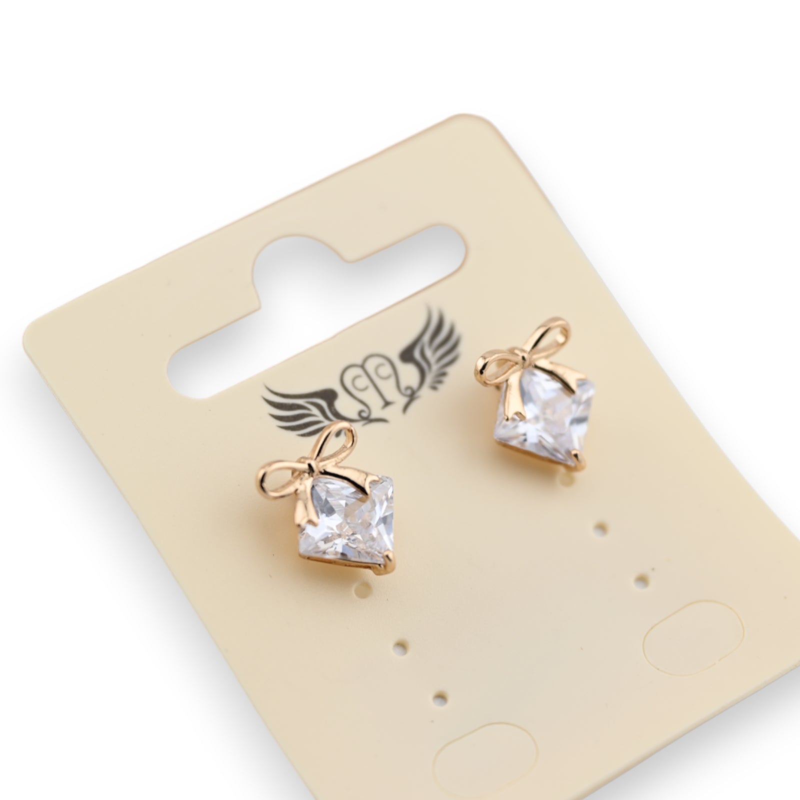 Boucle d'oreille fantaisie dorée pierre brillante noeud