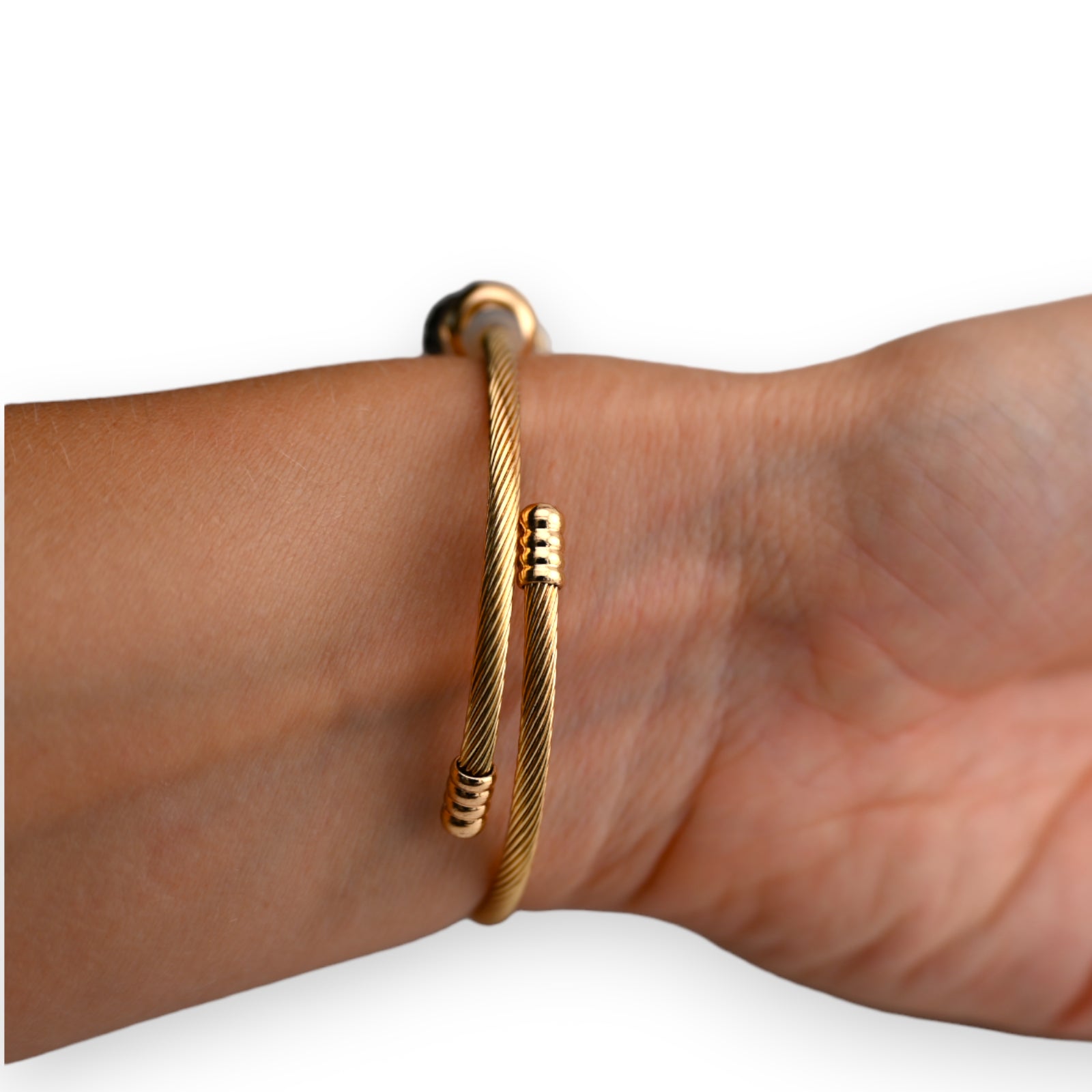 Bracelet charms rigide noir et doré cœur strass