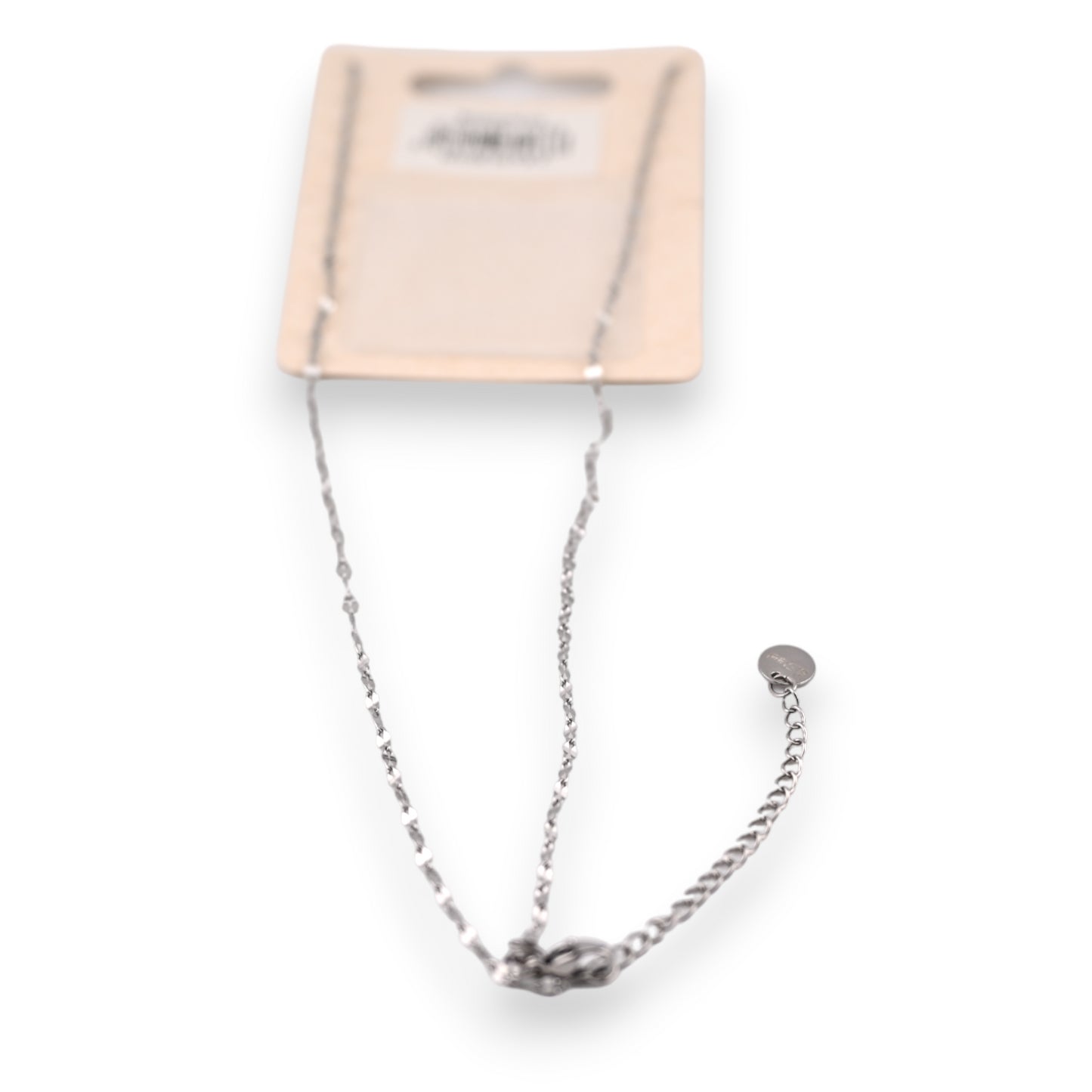 Collier acier argenté médaillon strass et étoile ajourée