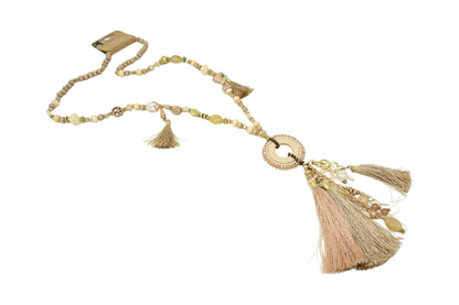Collier sautoir fantaisie nuances beige médaillon rond pompons et breloques