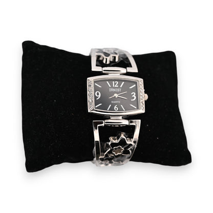 Montre fantaisie argentée détails fleurs noires
